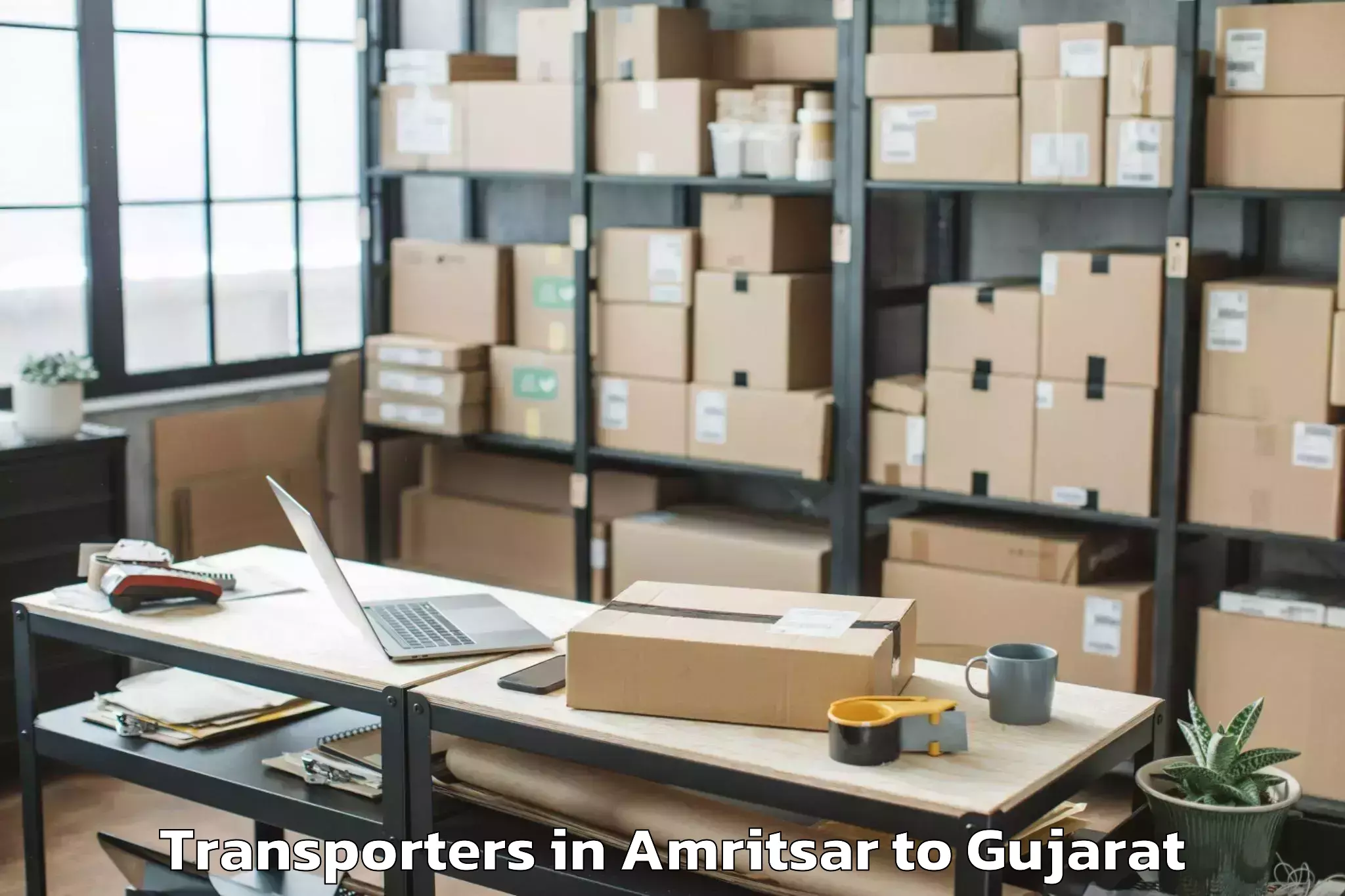 Book Amritsar to Gujarat University Of Transpla Transporters